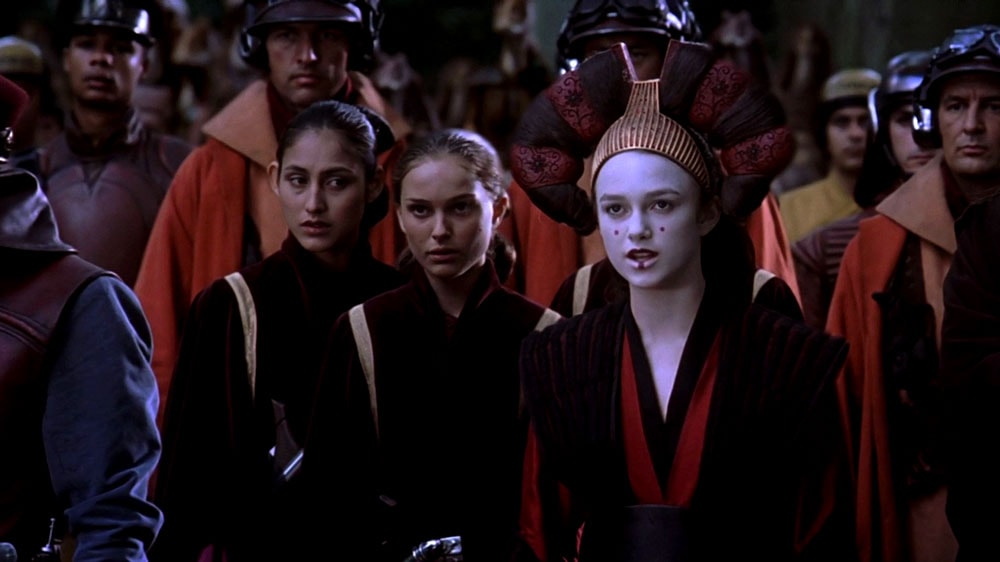 (L-R): Rabé (Karol Cristina Da Silva), Padmé (Natalie Portman), and Sabé (Keira Knightley) in a scene from The Phantom Menace - Lucasfilm Ltd.