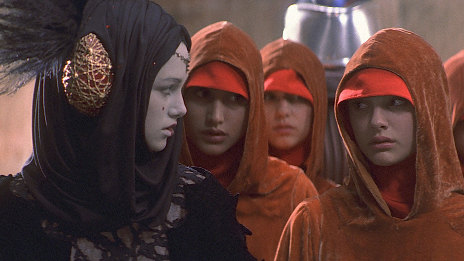 (L-R): Sabé (Keira Knightley), Rabé (Karol Cristina Da Silva), and Padmé (Natalie Portman) in a scene from The Phantom Menace - Lucasfilm Ltd.