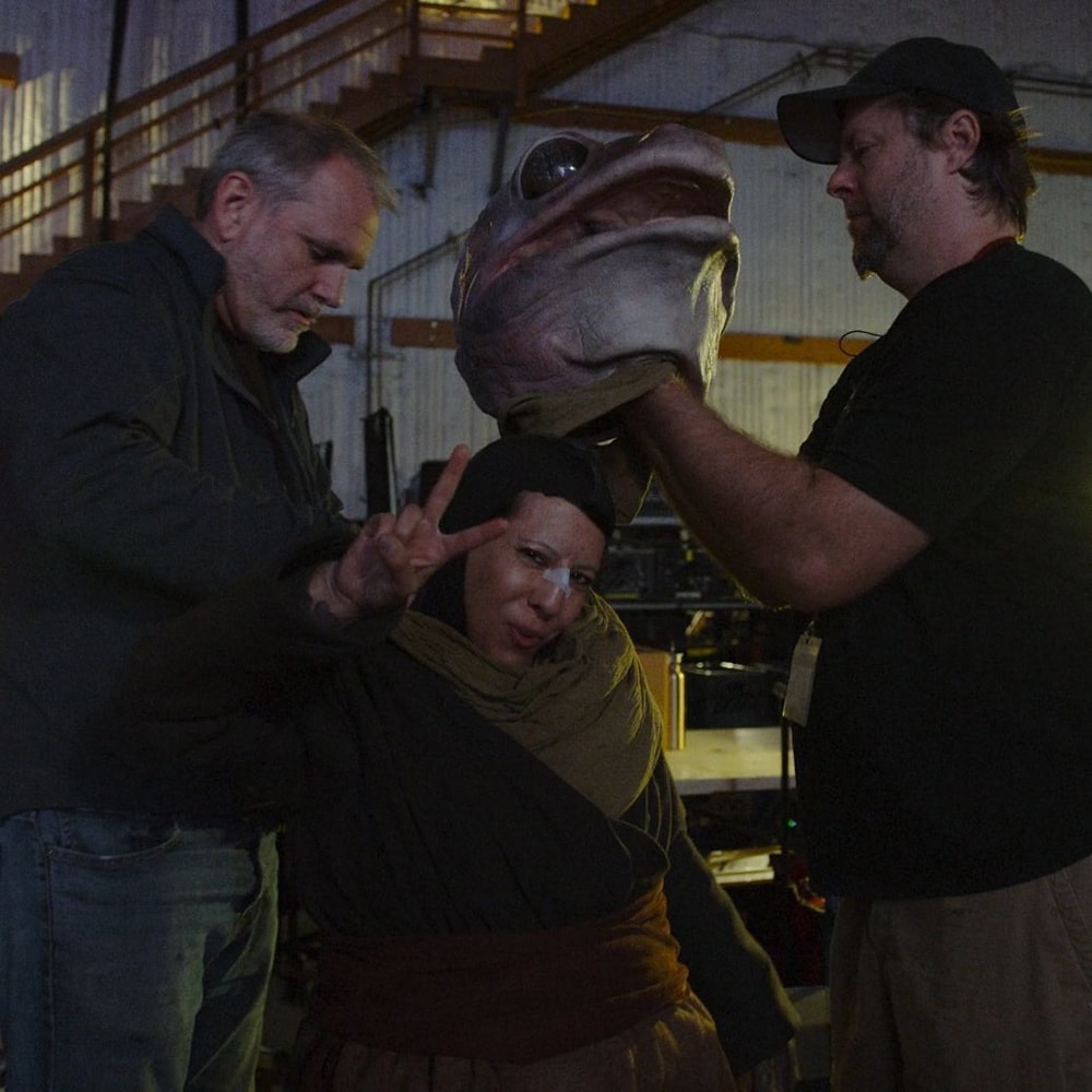 Misty Rosas putting on the Frog Lady suit with Legacy Effects Team, Alan Scott and Michael Manzel - Legacy Effects/Lucasfilm Ltd.