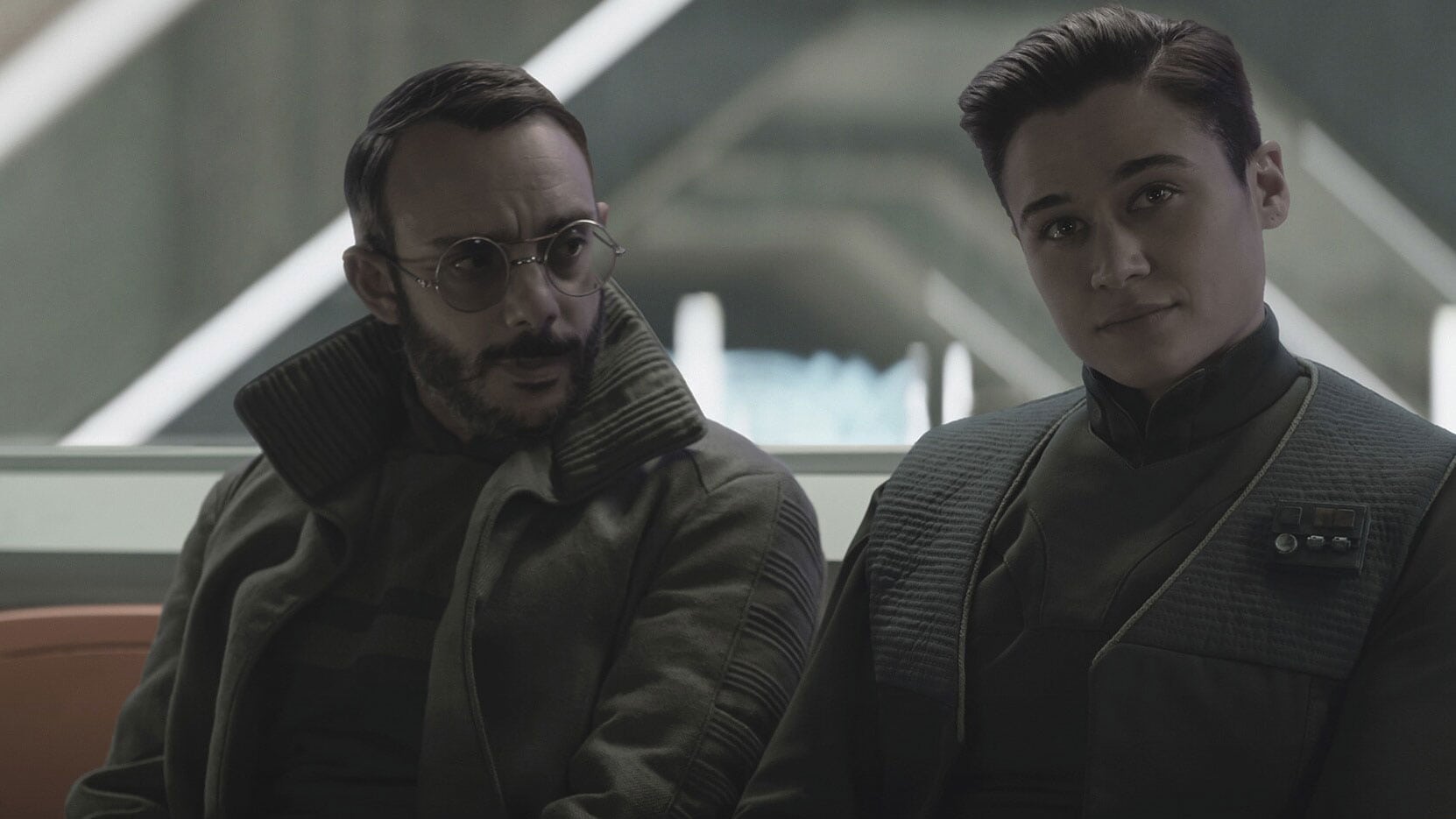 Dr. Pershing (Omid Abtahi) and Elia Kane (Katy O'Brian) in The Mandalorian Chapter 19: The Convert - Lucasfilm Ltd.