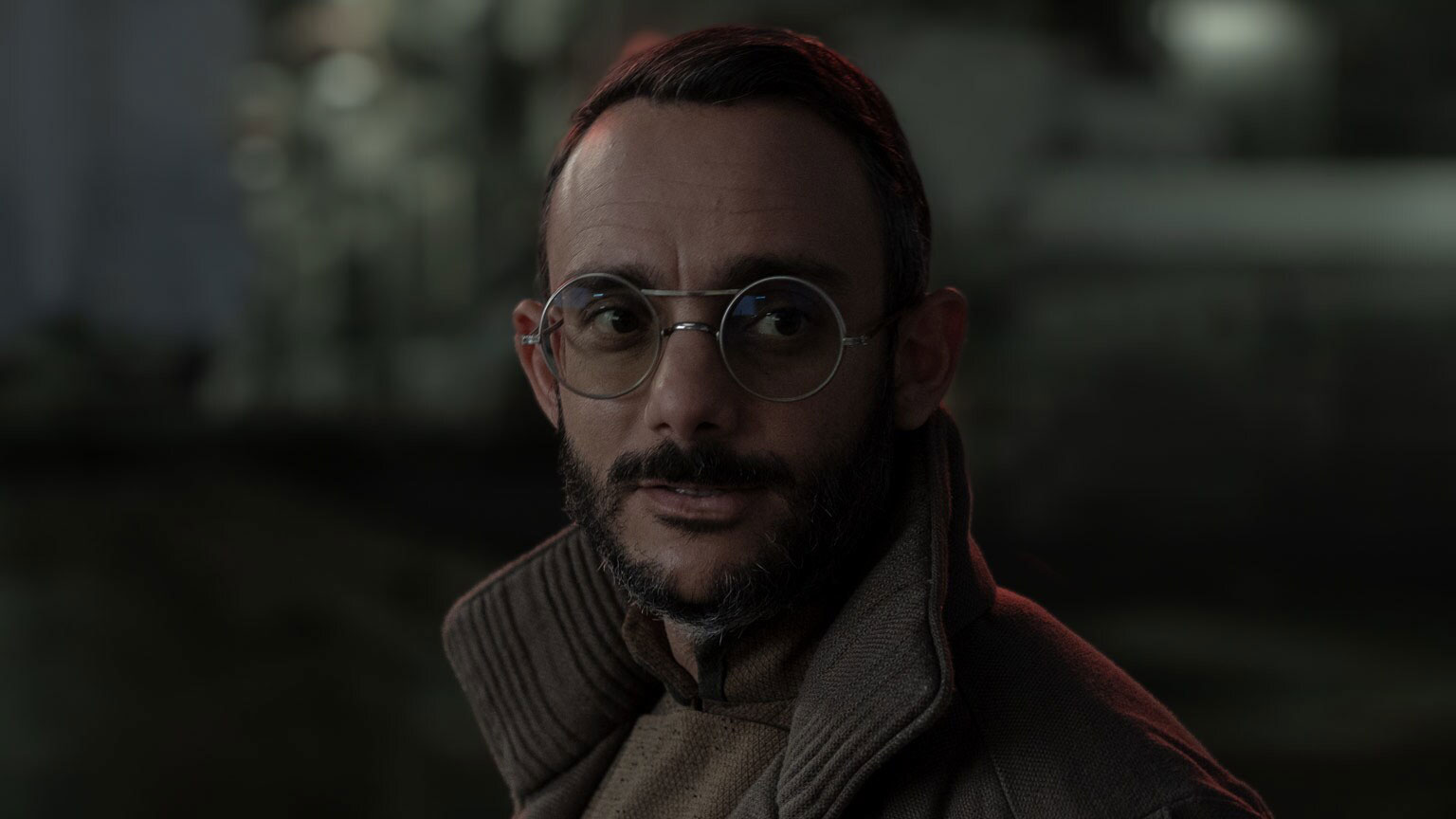 Dr. Pershing (Omid Abtahi) in The Mandalorian Chapter 19: The Convert - Lucasfilm Ltd.
